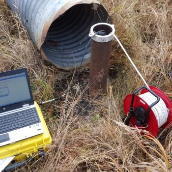 When we get to our site we hook up the logger to our laptops to download the data and reprogram the loggers. We use the dipper to collect manual water level data and are cleaned after every individual well visit.