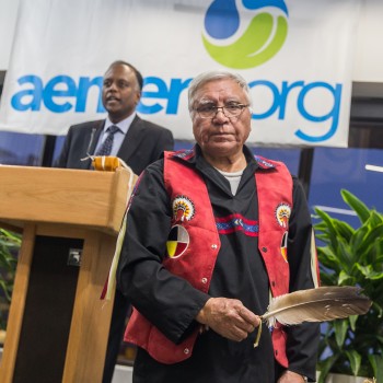 Elder and AEMERA Board Member Mike Beaver performs a smudge at open house